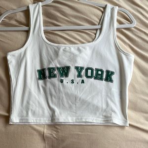 shein top, white shirt with green lettering
